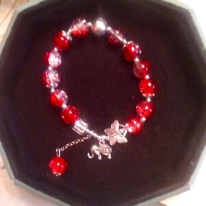 one size fits all beautifully made glass beads with elephant charm butterfly har